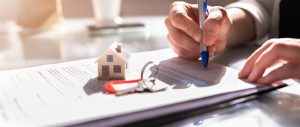Signing House Rental Contract Document And Property Lending