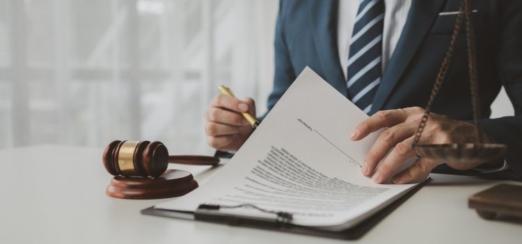 Lawyer is signing contract