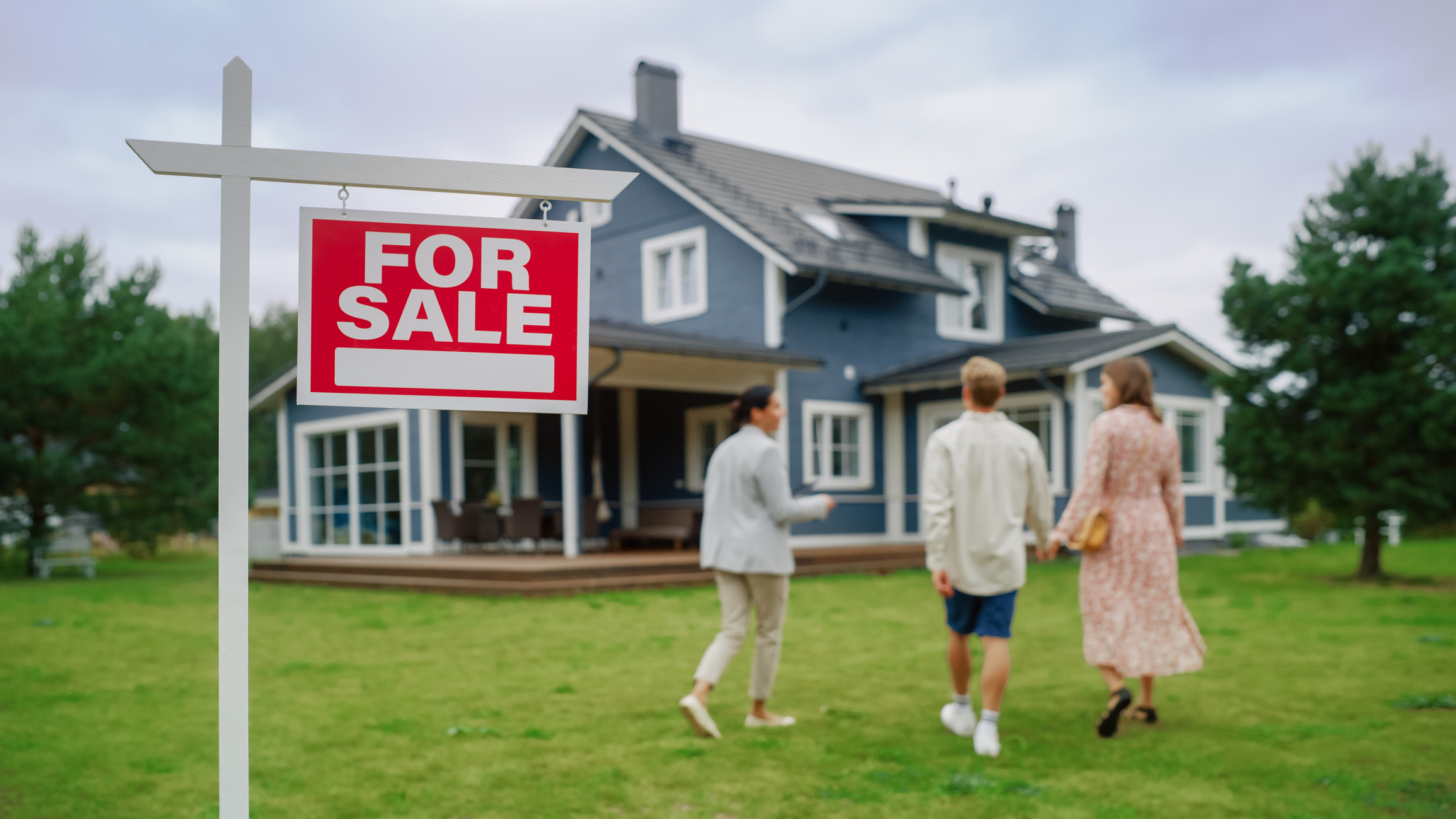 real estate agent Meeting a Beautiful Successful Couple in Front of a Modern Big House That is For Sale Real Estate Agent Selling or Renting Out a New Home to a Young Family For Sale Sign on Front Lawn
