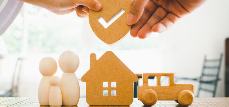 Businessman holding shield protect icon with his child, Security protection and health insurance. The concept of family home, protection, health care day, car insurance and home school education.